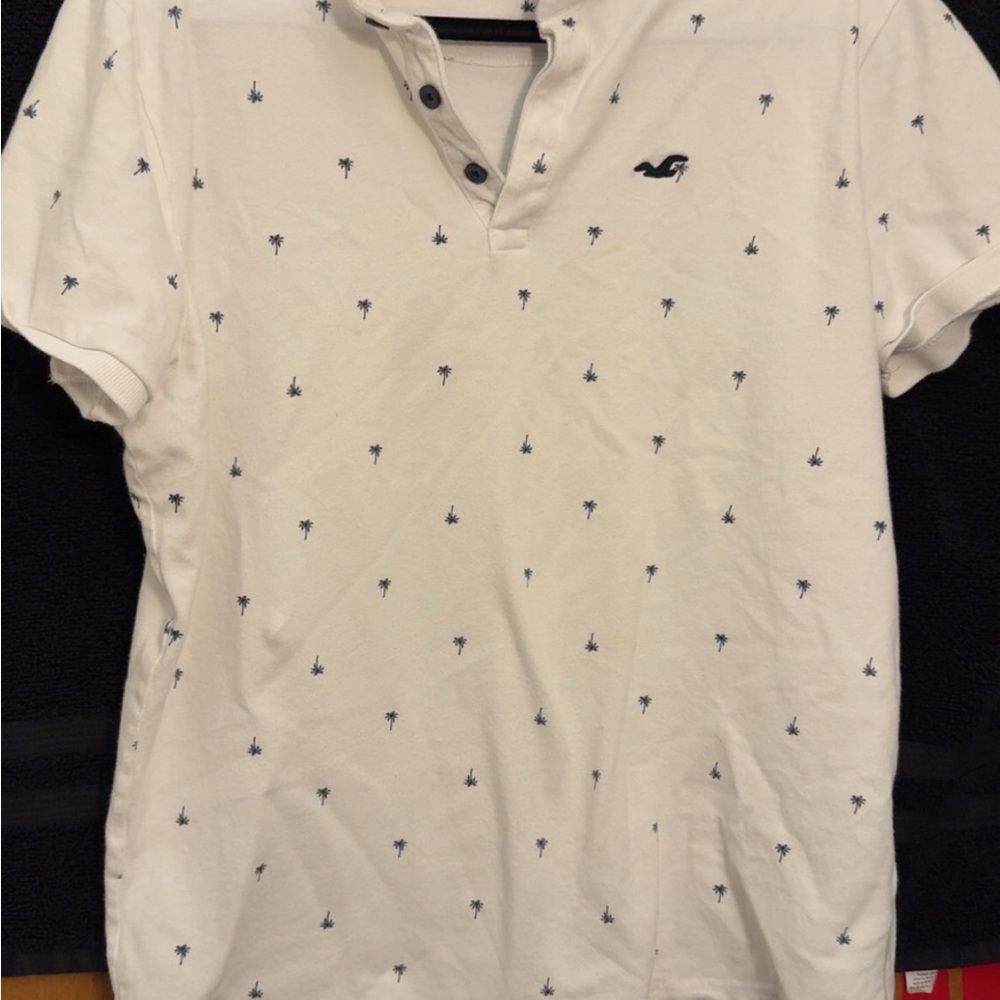 Hollister Cream Polo with Navy Palm Tree Pattern
